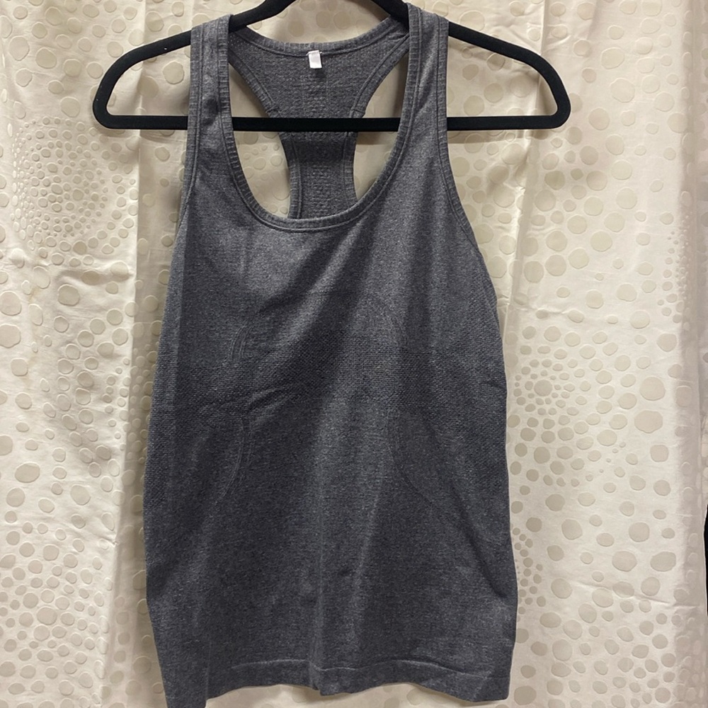 63 -Lululemon Swiftly Tech Racerback
Black / White- size 6